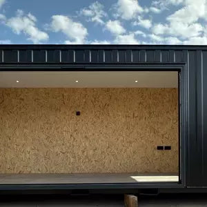 CONTENEDOR DE OFICINA 6,4 X 2,4 M CON PUERTA PLEGABLE